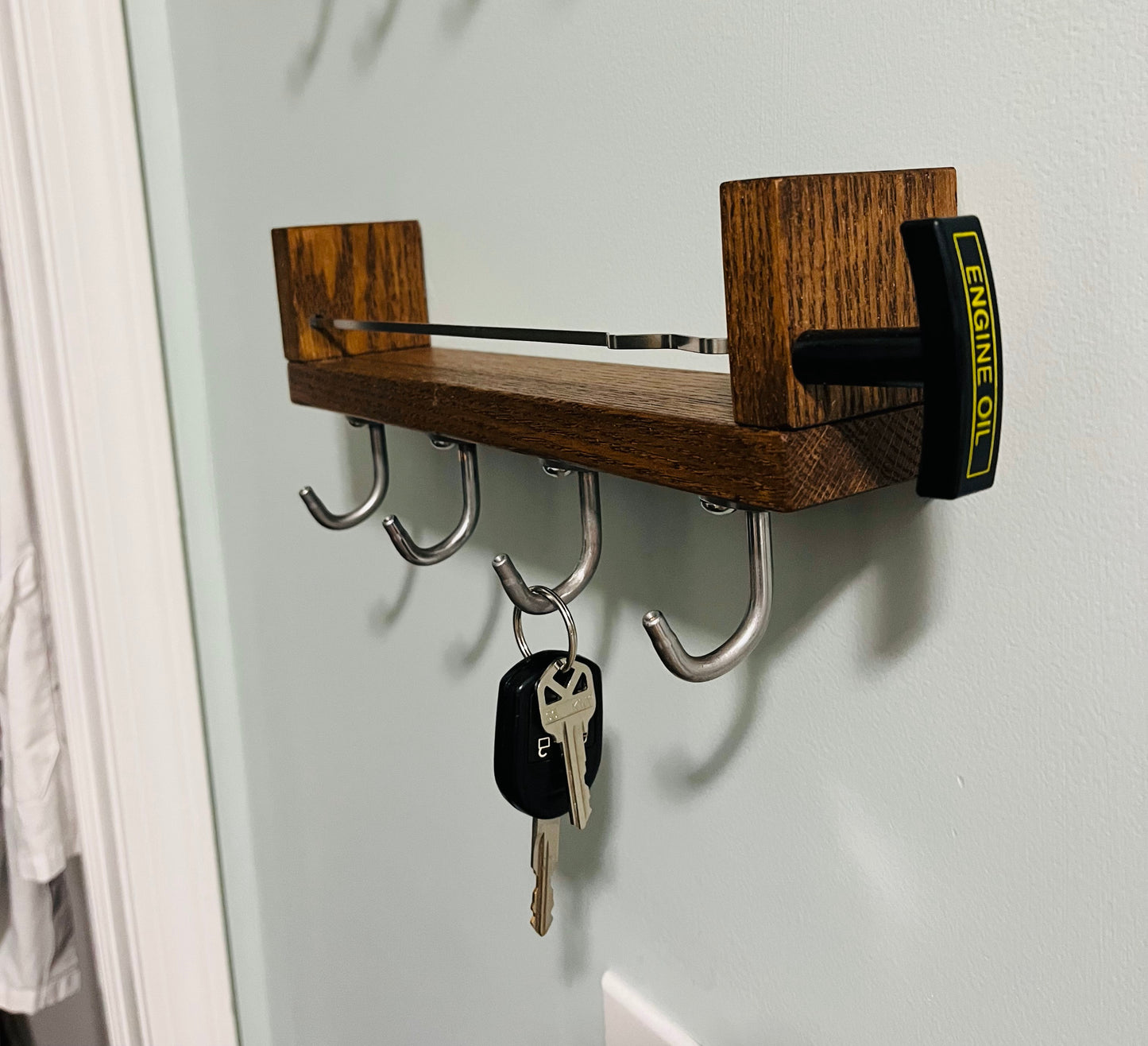 Key Hook Shelf - from piston cooling jets and dipstick